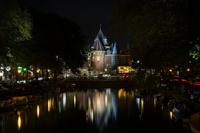 Amsterdam: Haunted History and Ghost Walking Tour - Starting behind Dam Square’s grand facade