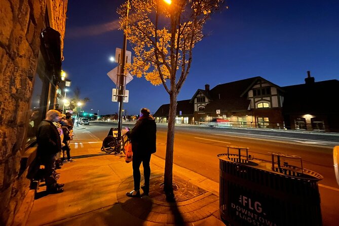 Mountain Town Of Madness, Original <em>Adult Only</em> Haunted Downtown Flagstaff Tour – Key points to know before you go’ /></p>
<ul>
<li><strong>The tour begins at 9:00 p.m. near Flagstaff City Hall and Wheeler Park</strong>, then returns to the same meeting point.</li>
<li><strong>You walk about one mile over 90 minutes</strong>, so comfortable shoes matter more than costumes or props.</li>
<li><strong>The group is limited to 18 people</strong>, a useful size for hearing a guide’s stories on city sidewalks.</li>
<li><strong>The route passes theaters, hotels, shops, the railroad district, and a library</strong>, with each stop tied to a different ghost tale or dark chapter.</li>
<li><strong>You do not enter the historic buildings</strong>, so the experience depends almost entirely on the guide’s voice, timing, and storytelling.</li>
<li><strong>Free cancellation is available up to 24 hours before departure</strong>, while poor weather or too few bookings can lead to a refund or alternate date.</li>
</ul>
<h2>A 9 p.m. start sets the right mood</h2>
<p>Adult Only</em> Haunted Downtown Flagstaff Tour – A 9 p.m. start sets the right mood’ /></p>
<p><p>The tour starts at 212 West Aspen Avenue, between Flagstaff City Hall and Wheeler Park. That location gives you a practical place to gather before setting off, and the opening talk puts downtown Flagstaff into context before the darker material begins.</p>
</p>
<p><p>The 9 p.m. start is useful for two reasons. First, the city has settled into night, so theaters, hotels, and old storefronts feel different than they do during daylight. Second, the late hour makes this an easy add-on after dinner.</p>
</p>
<p><p>You should arrive ready to walk, not waiting for a bus or trolley. The route covers about one mile, and the experience lasts roughly an hour and a half. The tour ends back at the starting point, which simplifies the rest of your evening.</p>
</p>
<p><p>The group limit of 18 is another practical plus. A smaller crowd helps you stay close to the guide and gives the stories room to breathe. Still, this is a sidewalk tour. Street noise, passing pedestrians, and uneven pacing can occasionally compete with the narration.</p>
</p>
<div class="twil" style="margin: 20px 0; padding: 15px 0;"><p>A few more hauntings around Flagstaff worth booking</p><ul style="margin: 10px 0; padding-left: 0; list-style: none;"><li style="margin: 0 0 12px 0; padding: 0 0 12px 0; border-bottom: 1px solid #E8E2EB; line-height: 1.4;"><a href="https://ghosttourlover.com/downtown-flagstaff-haunted-history-tour/">Downtown Flagstaff Haunted History Tour</a><br><span style="font-size: 0.82em; color: #555;"><span style="color: #5B2E6E;">★</span> 5.0 &nbsp;&middot;&nbsp; 374 reviews</span></li><li style="margin: 0 0 12px 0; padding: 0 0 12px 0; border-bottom: 1px solid #E8E2EB; line-height: 1.4;"><a href="https://ghosttourlover.com/hells-highway-adults-only-nighttime-walking-ghost-tour-in-flagstaff/">Hell’s Highway Adults-Only Nighttime Walking Ghost Tour in Flagstaff</a><br><span style="font-size: 0.82em; color: #555;"><span style="color: #5B2E6E;">★</span> 4.5 &nbsp;&middot;&nbsp; 100 reviews</span></li><li style="margin: 0; padding: 0; border-bottom: none; line-height: 1.4;"><a href="https://ghosttourlover.com/forbidden-frights-of-flagstaff-ghost-tour/">Forbidden Frights of Flagstaff Ghost Tour</a><br><span style="font-size: 0.82em; color: #555;"><span style="color: #5B2E6E;">★</span> 4.5 &nbsp;&middot;&nbsp; 52 reviews</span></li></ul></div><h2>The opening connects Flagstaff to its railroad past</h2>
<p>Adult Only</em> Haunted Downtown Flagstaff Tour – The opening connects Flagstaff to its railroad past’ /></p>
<p><p>The first part of the walk deals with Flagstaff’s growth and the role of the railroad. That may sound less spooky than a haunted hotel, but it gives the evening useful shape.</p>
</p>
<p><p>Flagstaff expanded in close connection with the railroad, and the city’s hotels, theaters, shops, and working districts grew around that movement of people and money. Understanding that helps you see the old buildings as more than attractive facades. They were places where workers, performers, business owners, drifters, and unfortunate souls crossed paths.</p>
</p>
<p><p>I like this start because it keeps the tour from becoming a string of disconnected ghost claims. You get a little civic background before the stories turn darker. If you want nonstop scares from the first minute, though, the historical introduction may feel slow.</p>
</p>
<h2>The first theater stop mixes art with spirits</h2>
<p><img width="669" height="446" decoding="async" src=